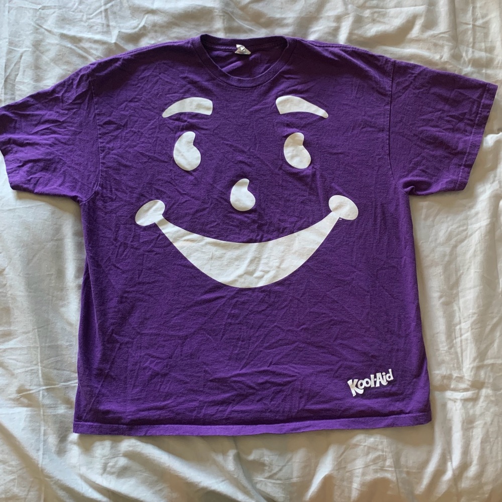 Step back in time with this exclusive vintage Kool-Aid shirt!🍇🟣
